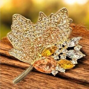 Elegant Gold Tone Leaf Brooch with Green and Silver tone Accents